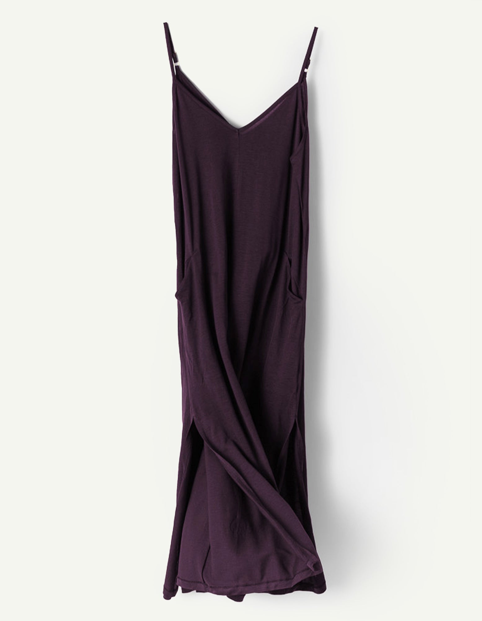 AWAN Boho Slip Dress in Deep Plum, featuring a relaxed fit with adjustable spaghetti straps and practical pockets, made from soft and breathable fabric for versatile styling